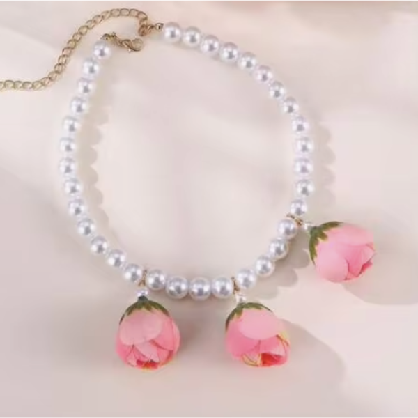 Pearl dog necklace with pink rosebud charms